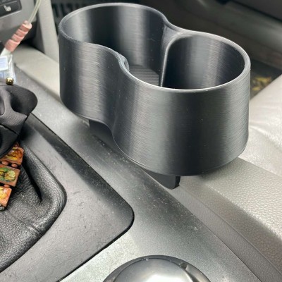 BMW E60/E61 Двойна поставка за чаши 